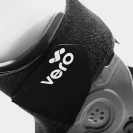 Man trying on a running shoe while wearing a Vero Ankle® Brace.